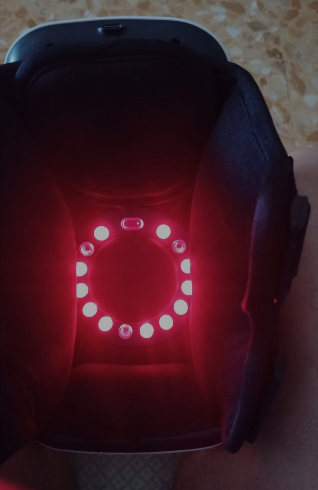 Real close-up of the circular interior light array illuminated red