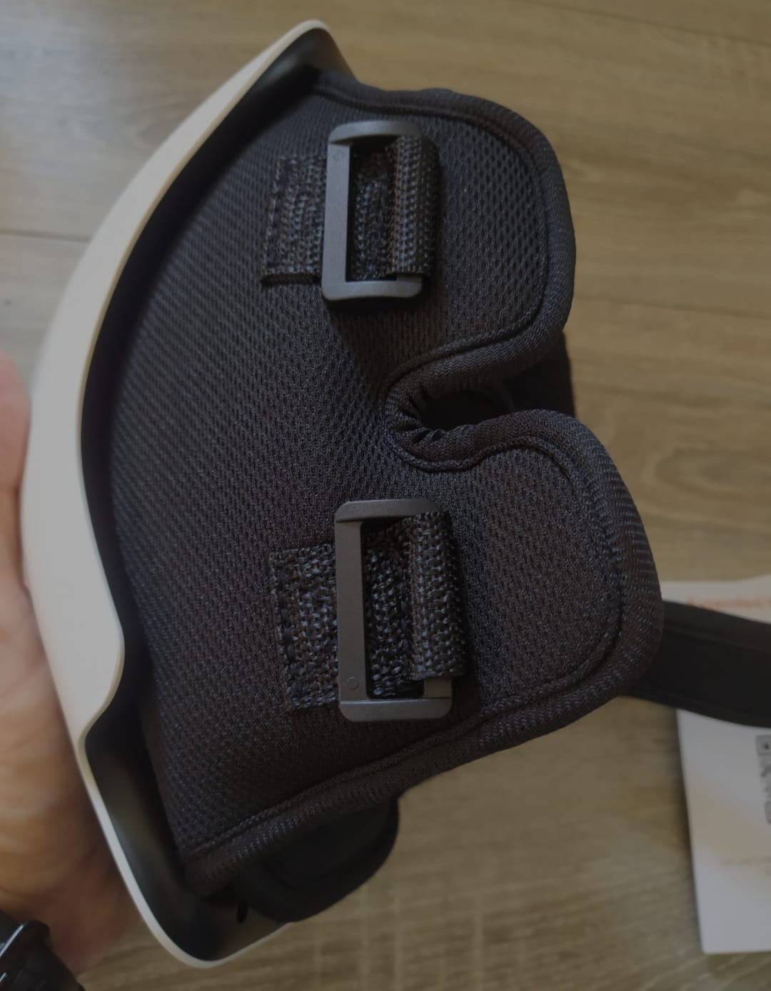 Real close-up of the Kneova padded interior and two strap buckles